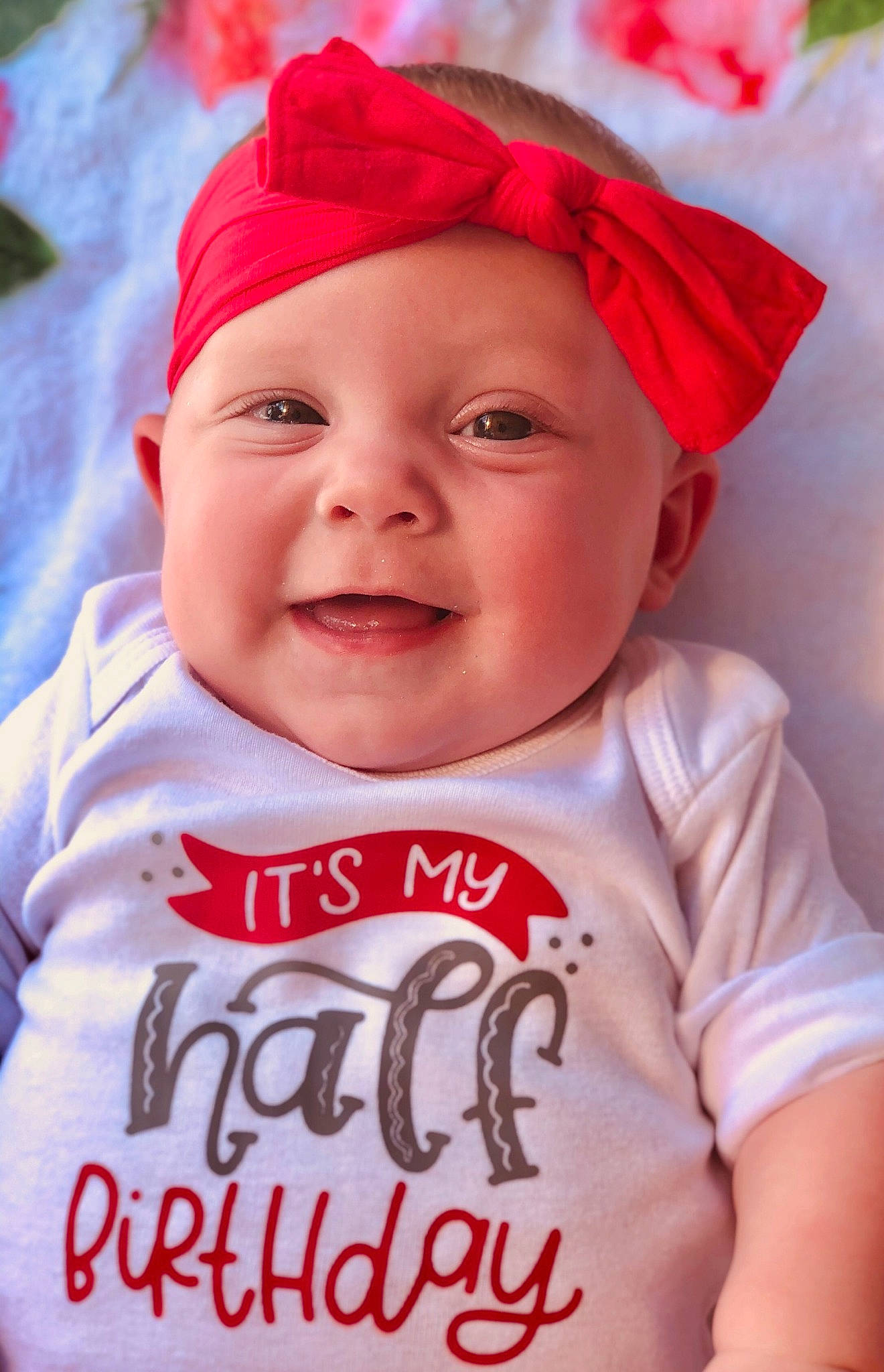 Mykah joined the competition — help win amazing prizes! baby, baby_laughing, baby_products, baby_toddler_clothing, cheek, child, facial_expression, happy, headgear, headwear, joy, lip, person, product, red, sleeve, smile, toddler