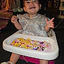 Ziora joined the competition — help win amazing prizes! toddler, child, high_chair, food, bib, smiling, happy, indoor, messy, tray, sandals, floor, blanket, curly_hair, person, cute, playful, meal, baby, dining