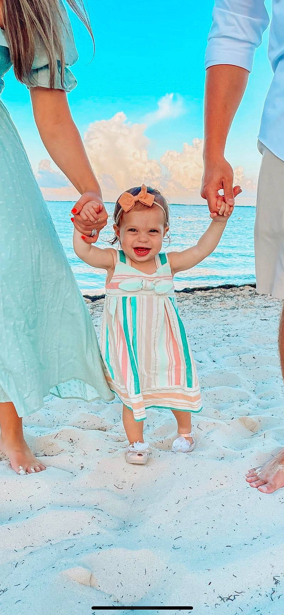 Vera joined the competition — help win amazing prizes! aqua, azure, beach, blue, dress, finger, fun, gesture, hand, happy, headwear, joy, leisure, people_in_nature, people_on_beach, person, photograph, pink, sky, standing