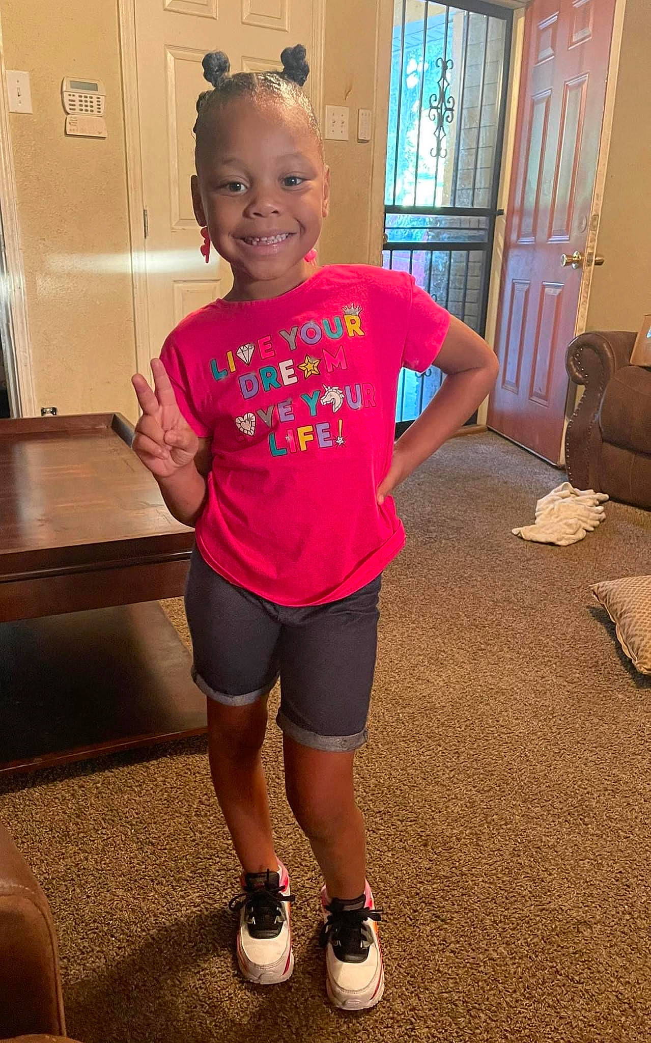 Allyson joined the competition — help win amazing prizes! child, door, flooring, fun, happy, human_body, joint, joy, knee, leisure, person, pink, shorts, shoulder, sleeve, smile, sneakers, standing, t_shirt, thigh