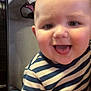 Axel is registered to the contest to win money with this photo: baby, child, smiling, striped_shirt, indoor, face, happy, cute, person, infant, cheeks, short_hair, sitting, closeup, young, toddler, joy, expression, casual_clothing, portrait