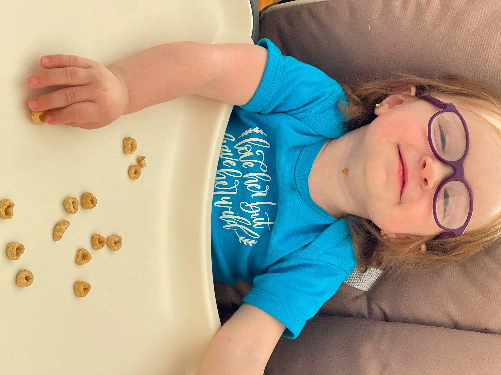 Madison is registered to the contest to win money with this photo: arm, beauty, comfort, couch, elbow, electric_blue, eyelash, finger, gesture, happy, human_leg, joint, joy, nail, neck, person, sleeve, t_shirt, textile, thigh