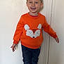 Mylan a rejoint le concours — aidez-le/la à gagner de superbes lots ! casual_clothing, child, cute, fashion, footwear, fox_design, full_body, happy, indoor, jeans, light_skin, orange_sweater, person, portrait, short_hair, smiling, sneakers, standing, trendy, young_child
