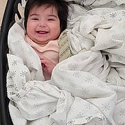 Delilah joined the competition — help win amazing prizes! baby, babylaughing, basket, blanket, crib, face, furniture, happy, head, infantbed, laughing, newborn, person, photography, portrait, smile