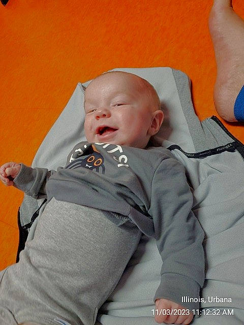 Archer is registered to the contest to win money with this photo: baby, baby_products, baby_sleeping, baby_toddler_clothing, cheek, child, chin, comfort, fun, happy, laugh, linens, mouth, person, room, sitting, sleeve, smile, t_shirt, toddler