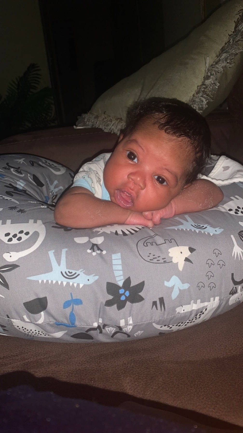 Zakyius is registered to the contest to win money with this photo: baby, baby_products, baby_toddler_clothing, bed, bed_sheet, bedding, bedtime, cheek, child, comfort, darkness, event, flash_photography, fun, head, linens, mouth, person, room, sitting