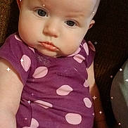 Penelope joined the competition — help win amazing prizes! baby, child, infant, purple_onesie, polka_dots, face, eyes, arm, leg, skin, couch, brown_background, sparkles, sitting, indoors, cute, expression, person, portrait, clothing