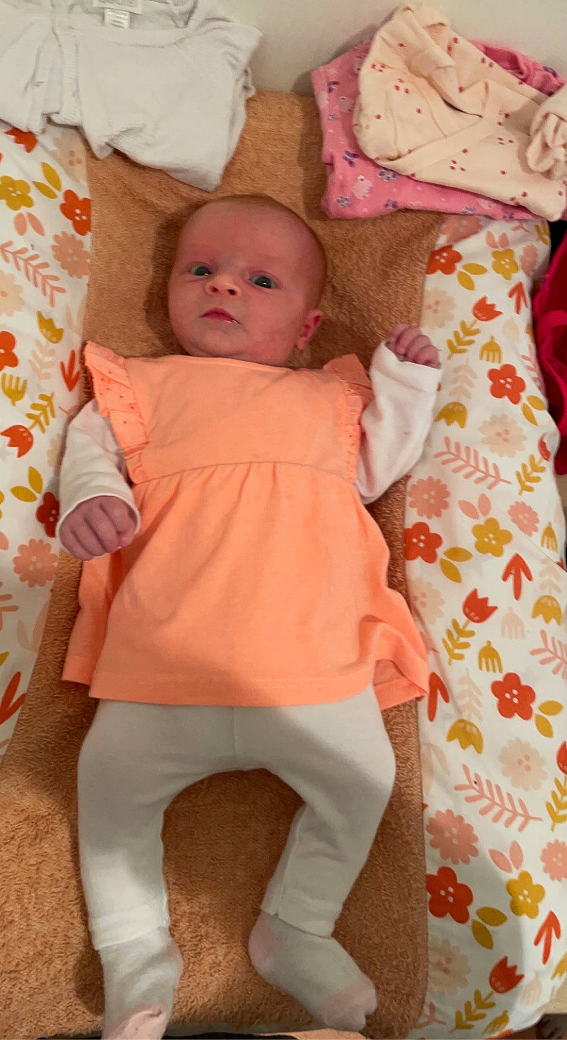 Emilyanna participe au concours pour gagner de l'argent avec cette photo : baby, baby_toddler_clothing, cheek, child, collar, comfort, eye, face, head, knee, linens, pattern, person, pink, product, skin, sleeve, stomach, textile, thigh