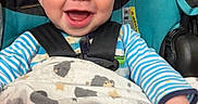 Bentley joined the competition — help win amazing prizes! baby, blanket, blue, car_seat, child, cozy, cute, face, happy, indoor, infant, pattern, person, plush, safety_harness, seat, smile, striped_clothing, toddler, young