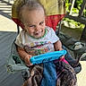 baby, blanket, candid, casual, chair, child, deck, face, greenery, happy, outdoor, playtime, porch, portrait, sitting, smiling, sunlight, tablet, technology, toddler