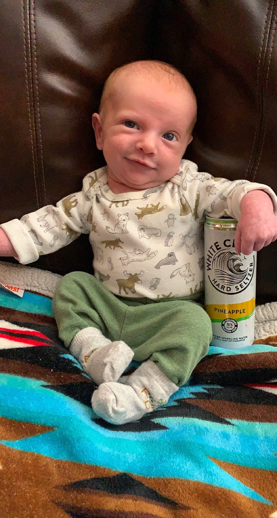 Houston joined the competition — help win amazing prizes! arm, baby, baby_toddler_clothing, cheek, child, comfort, facial_expression, finger, floor, flooring, fun, hairstyle, joy, organ, person, product, sitting, skin, sleeve, smile