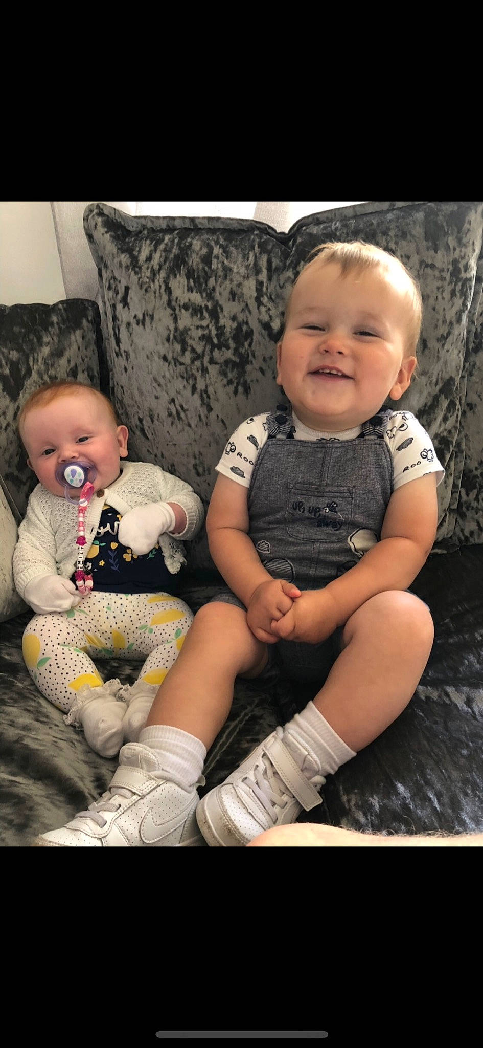 Riley is registered to the contest to win money with this photo: arm, baby, cheek, child, daughter, human, iris, joy, lap, leg, people, person, photograph, photography, product, sibling, sitting, skin, smile, thigh