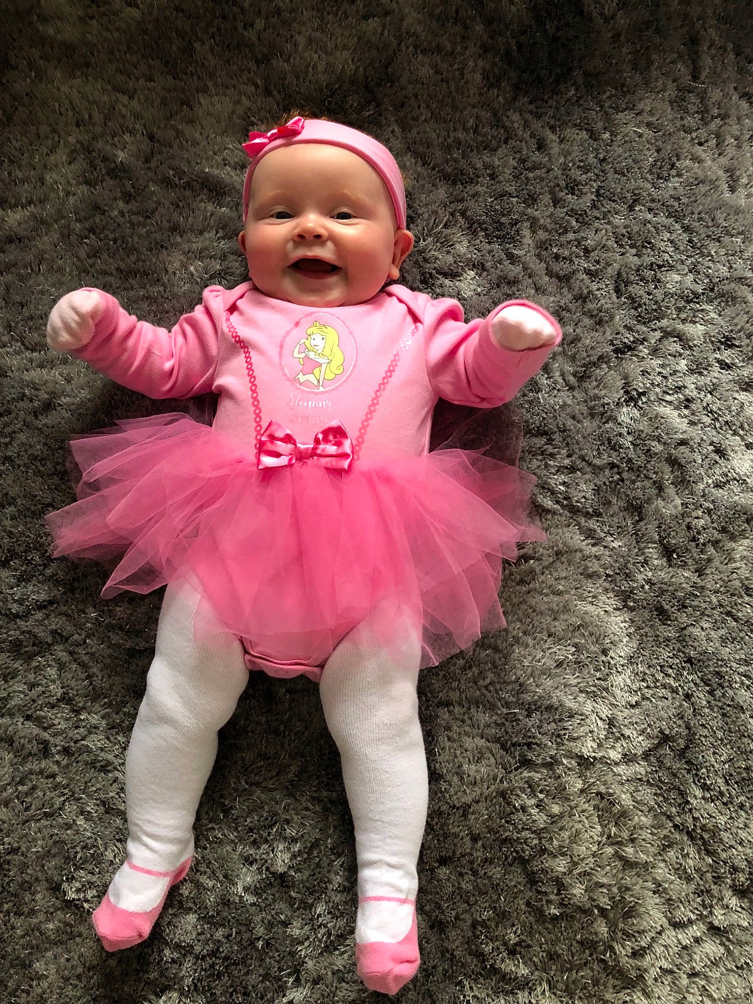 Emily-rose joined the competition — help win amazing prizes! baby, baby_toddler_clothing, ballet_tutu, child, clothing, costume, doll, dress, hair_accessory, headgear, headwear, magenta, person, pink, plant, toddler