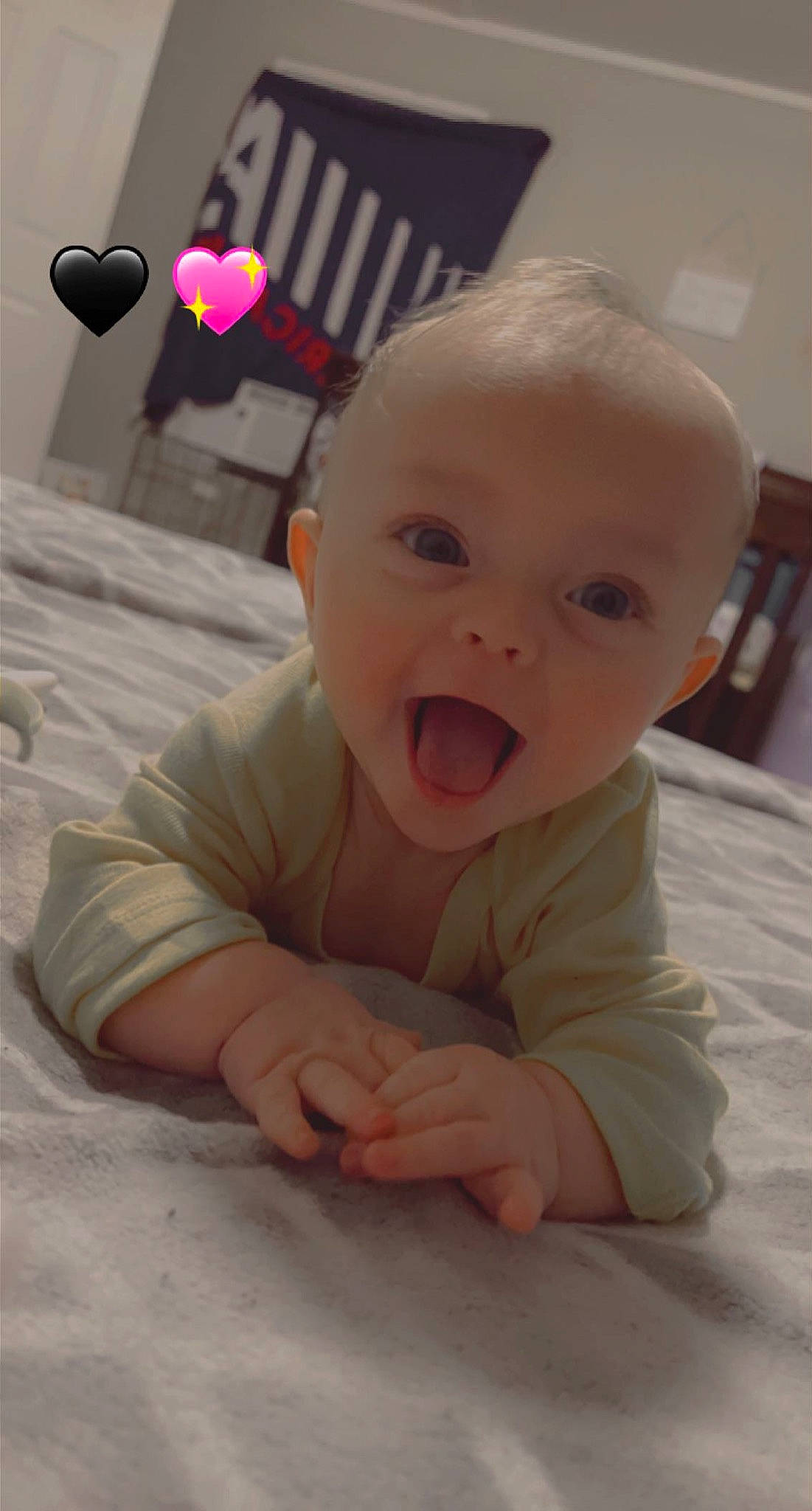 Preston is registered to the contest to win money with this photo: baby, baby_toddler_clothing, cheek, child, comfort, crawling, flooring, fun, happy, iris, microphone, mouth, nose, person, product, skin, sleeve, smile, toddler, tummy_time