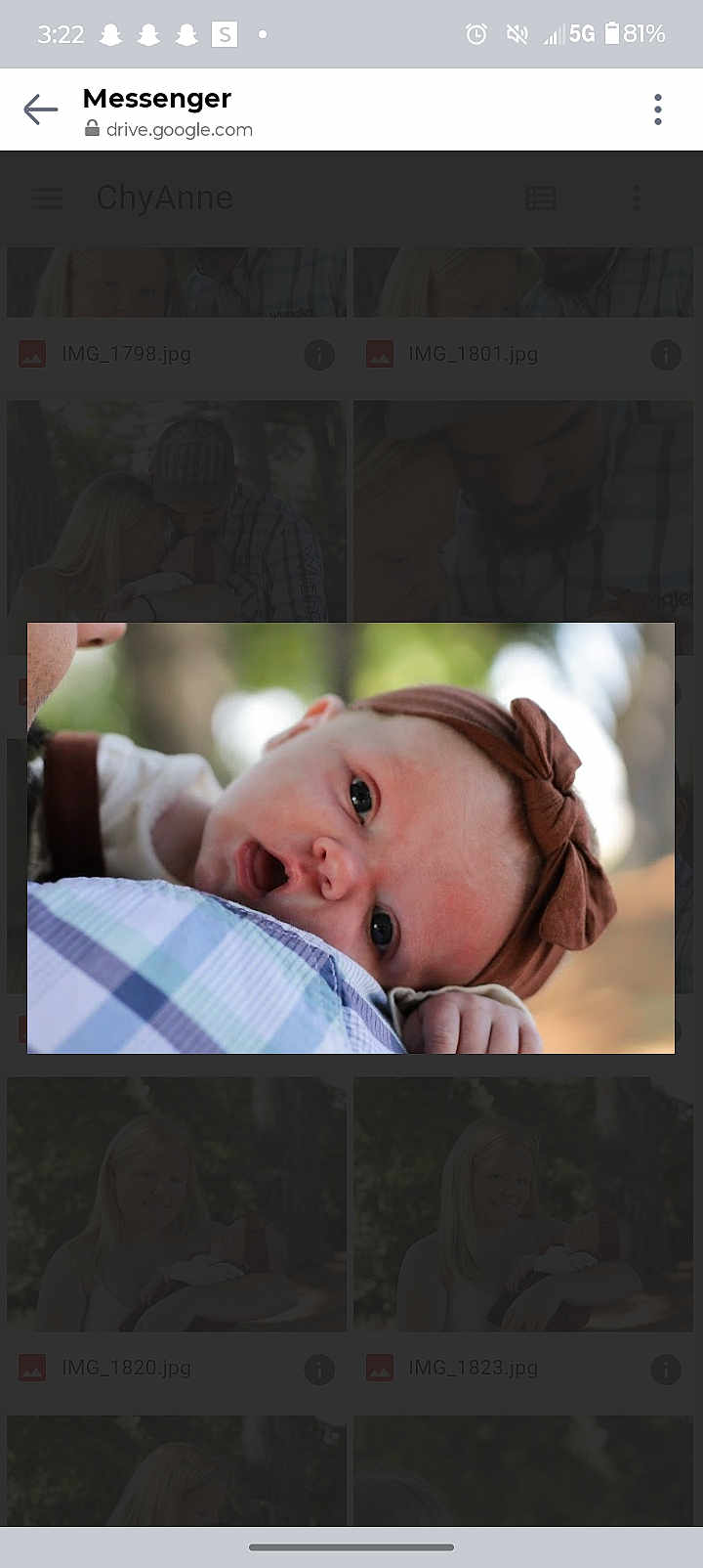 Georgia joined the competition — help win amazing prizes! baby, infant, headband, bow, face, eyes, mouth, shoulder, person, portrait, closeup, outdoor, blurred_background, clothing, skin, expression, child, newborn, head, cute