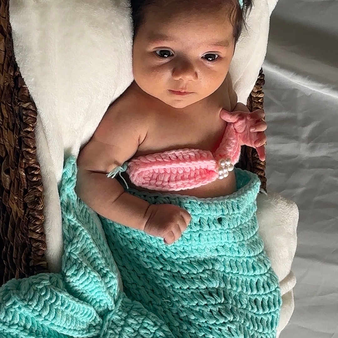 Bisan joined the competition — help win amazing prizes! baby, basket, blanket, child, cozy, crochet, cute, flower, handmade, headband, indoors, infant, mermaid_costume, newborn, pink, portrait, resting, sleeping_area, soft, turquoise