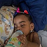 baby, bed, blanket, bottle, child, comfort, cute, face, hair_ties, hand, indoors, infant, milk, pajamas, peaceful, resting, sleeping, soft, toddler, young_child