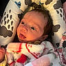 baby, infant, blanket, cushion, clouds, raindrops, face, head, person, child, cute, cozy, pattern, strawberry, seat, soft, expression, young, indoors, wrapped
