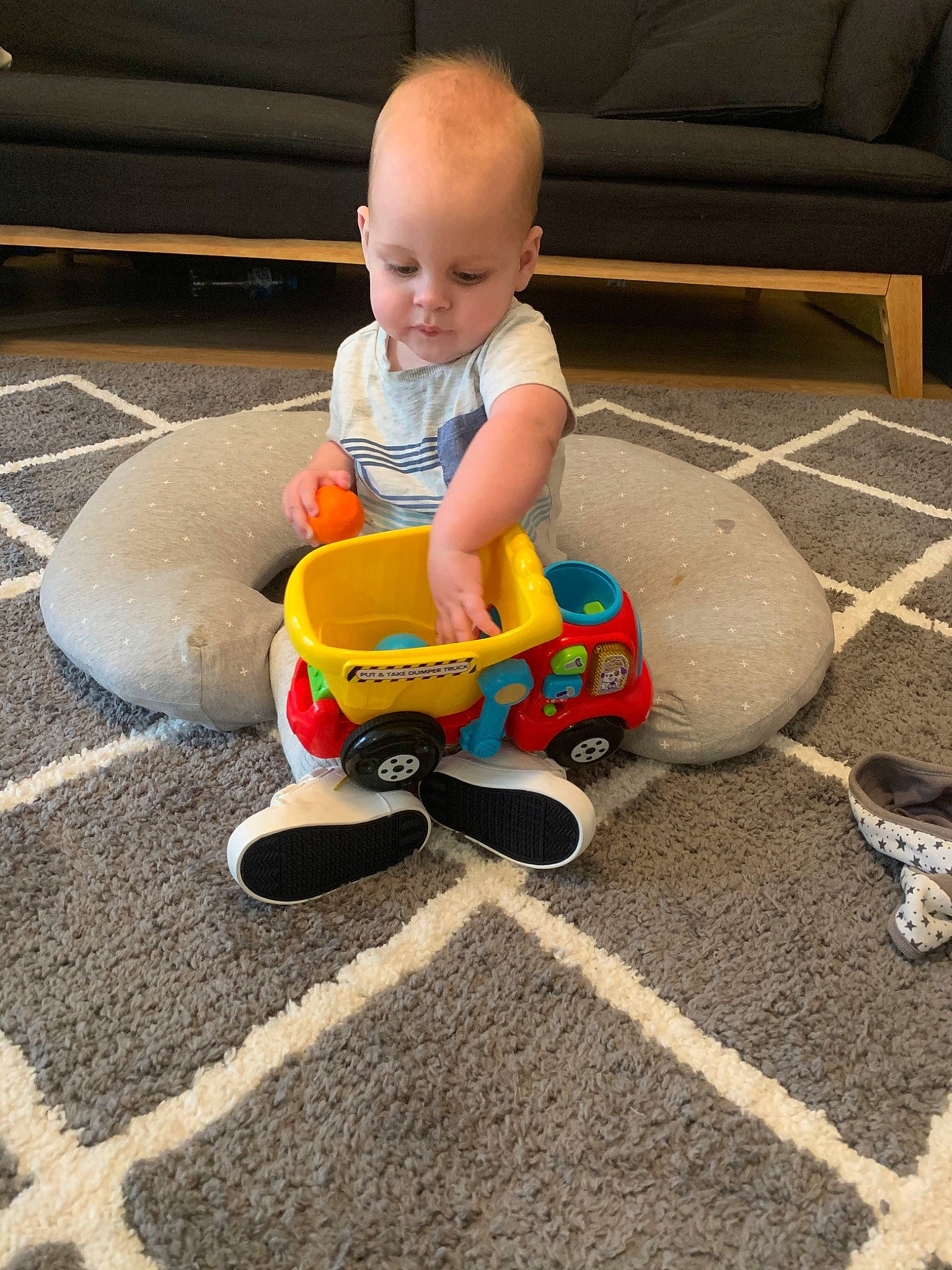Will is registered to the contest to win money with this photo: child, flooring, person, play, sitting, toddler, toy