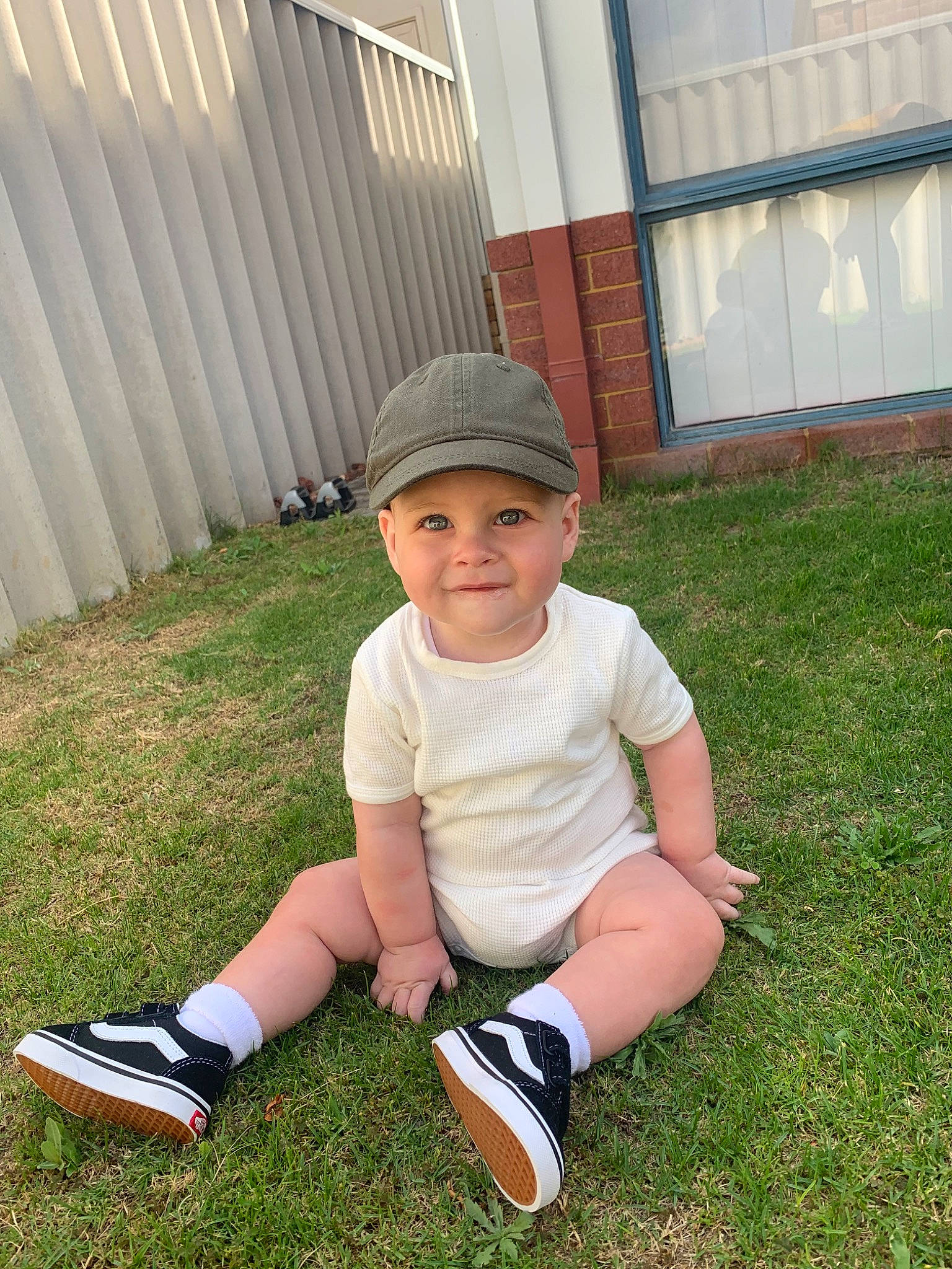 Will joined the competition — help win amazing prizes! child, cool, footwear, garden, grass, headgear, headwear, joy, lawn, leg, person, plant, shoe, sitting, smile, summer, toddler, vacation, yard