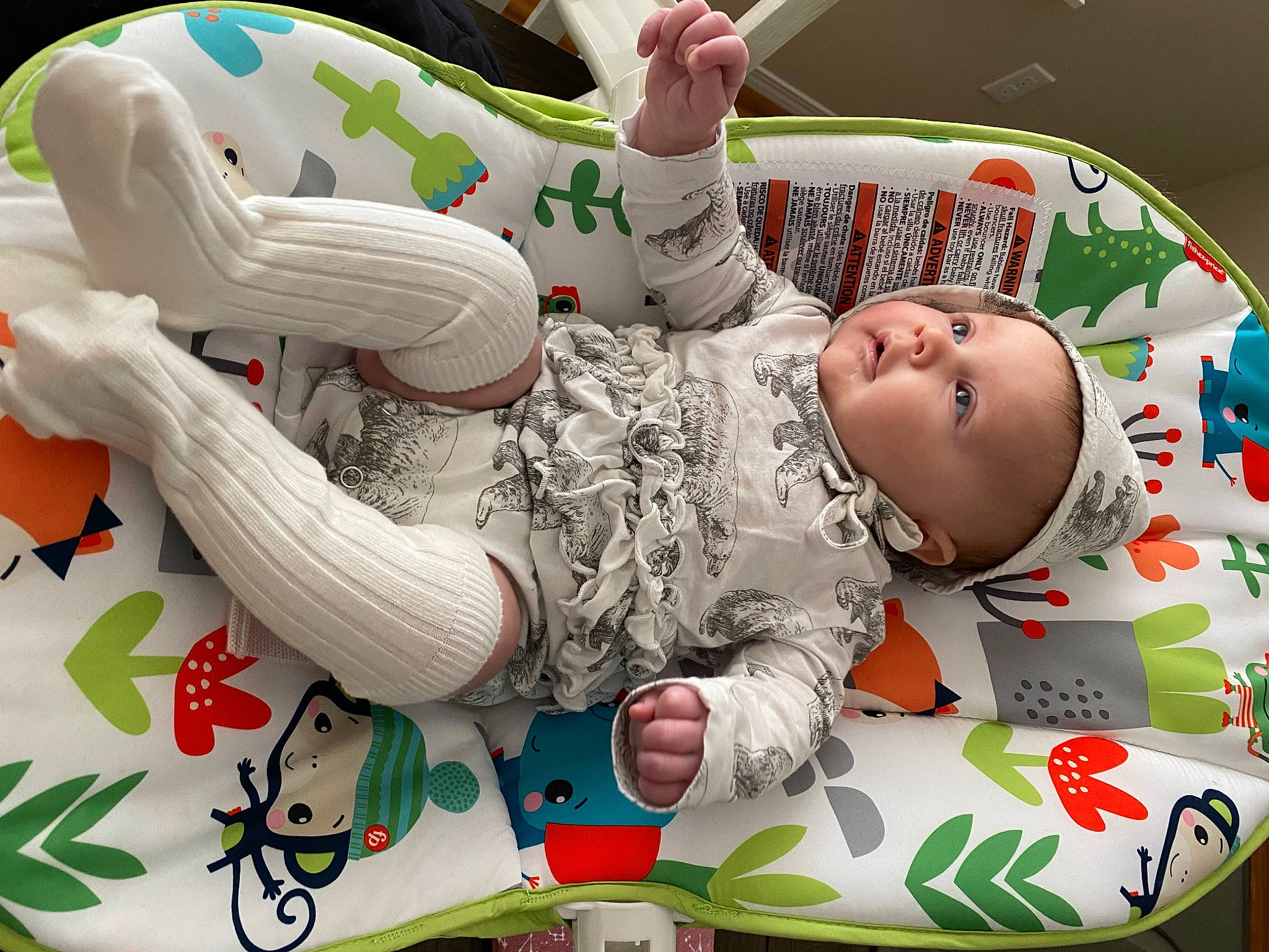 Kassidy joined the competition — help win amazing prizes! arm, baby, baby_products, baby_safety, baby_sleeping, baby_toddler_clothing, child, comfort, design, facial_expression, green, hand, linens, pattern, person, photograph, sitting, sleeve, textile, toddler