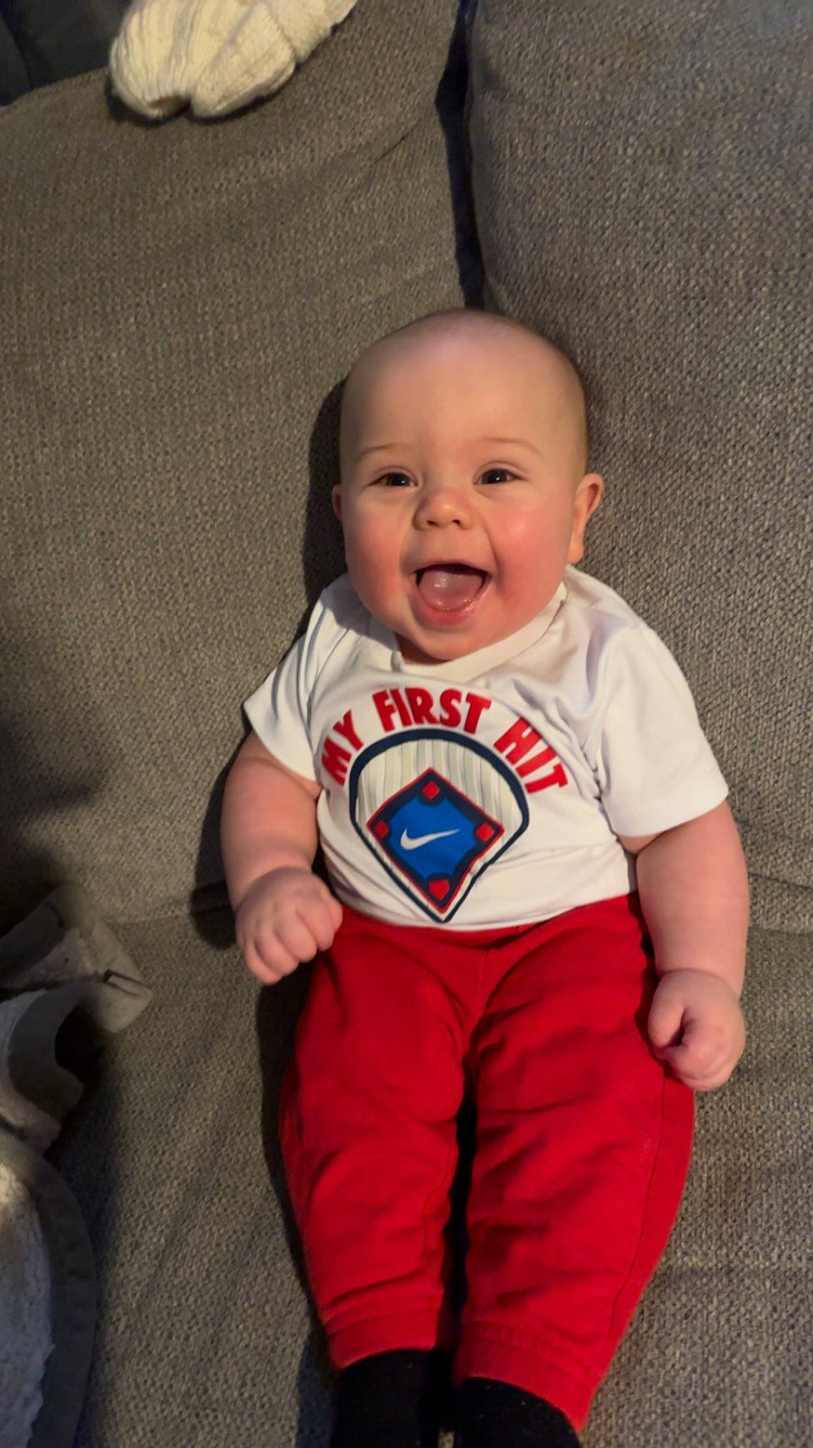 Asher is registered to the contest to win money with this photo: baby, baby_toddler_clothing, cheek, child, chin, clothing, cool, eye, finger, fun, hair, happy, human_body, mouth, nose, person, skin, sleeve, smile, t_shirt