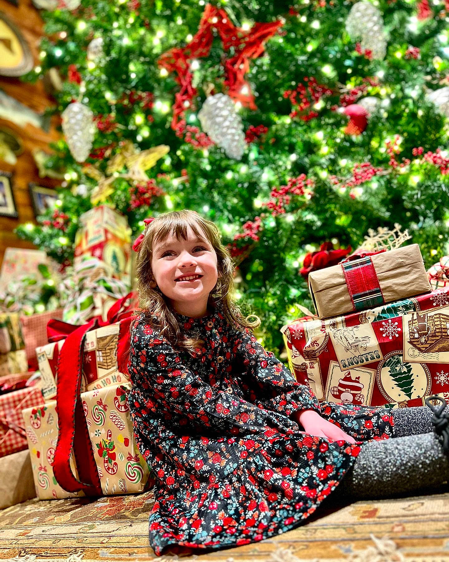 Ariel joined the competition — help win amazing prizes! christmas, christmas_decoration, christmas_ornament, christmas_tree, event, fun, grass, happy, holiday, joy, leaf, leisure, ornament, pattern, people_in_nature, person, plant, sitting, smile, tradition