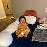Diana is registered to the contest to win money with this photo: baby, bed, blanket, bottle, carpet, child, comfortable, cozy, door, floor, happy, indoors, infant, milk, person, pillow, sitting, smiling, wall, yellow_dress
