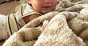 Roman joined the competition — help win amazing prizes! baby, child, infant, smiling, portrait, face, eyes, bed, blanket, bedding, bedroom, indoors, sunlight, warm_lighting, clothing, lying_down, cozy, cute, photography, home