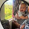 baby, infant, child, smiling, happy, portrait, mirror, reflection, adult, parent, holding, indoor, window, greenery, plaid, clothing, carrier, seated, home, photography