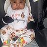 baby, child, infant, car_seat, thanksgiving, bib, hat, pajamas, footies, turkey, autumn, holiday, cute, wide_eyes, gloves, sitting, indoors, clothing, person, portrait