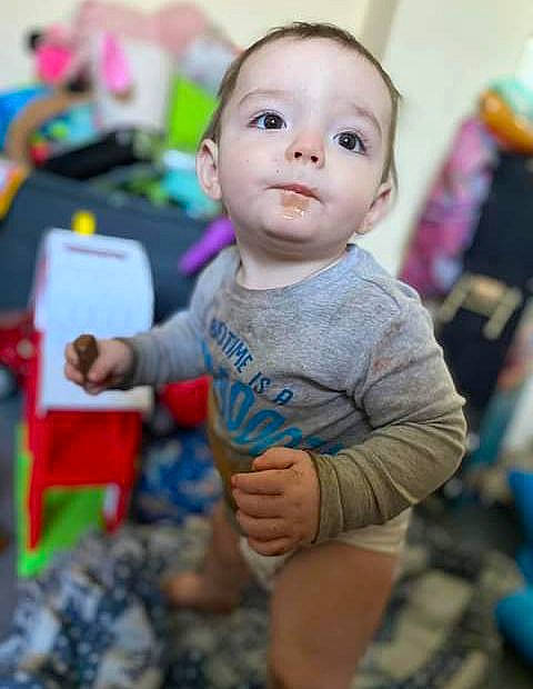 Aiden joined the competition — help win amazing prizes! baby, baby_products, baby_toddler_clothing, cheek, child, fun, gesture, happy, leisure, person, personal_protective_equipment, play, room, sitting, skin, t_shirt, toddler, toy, vacation