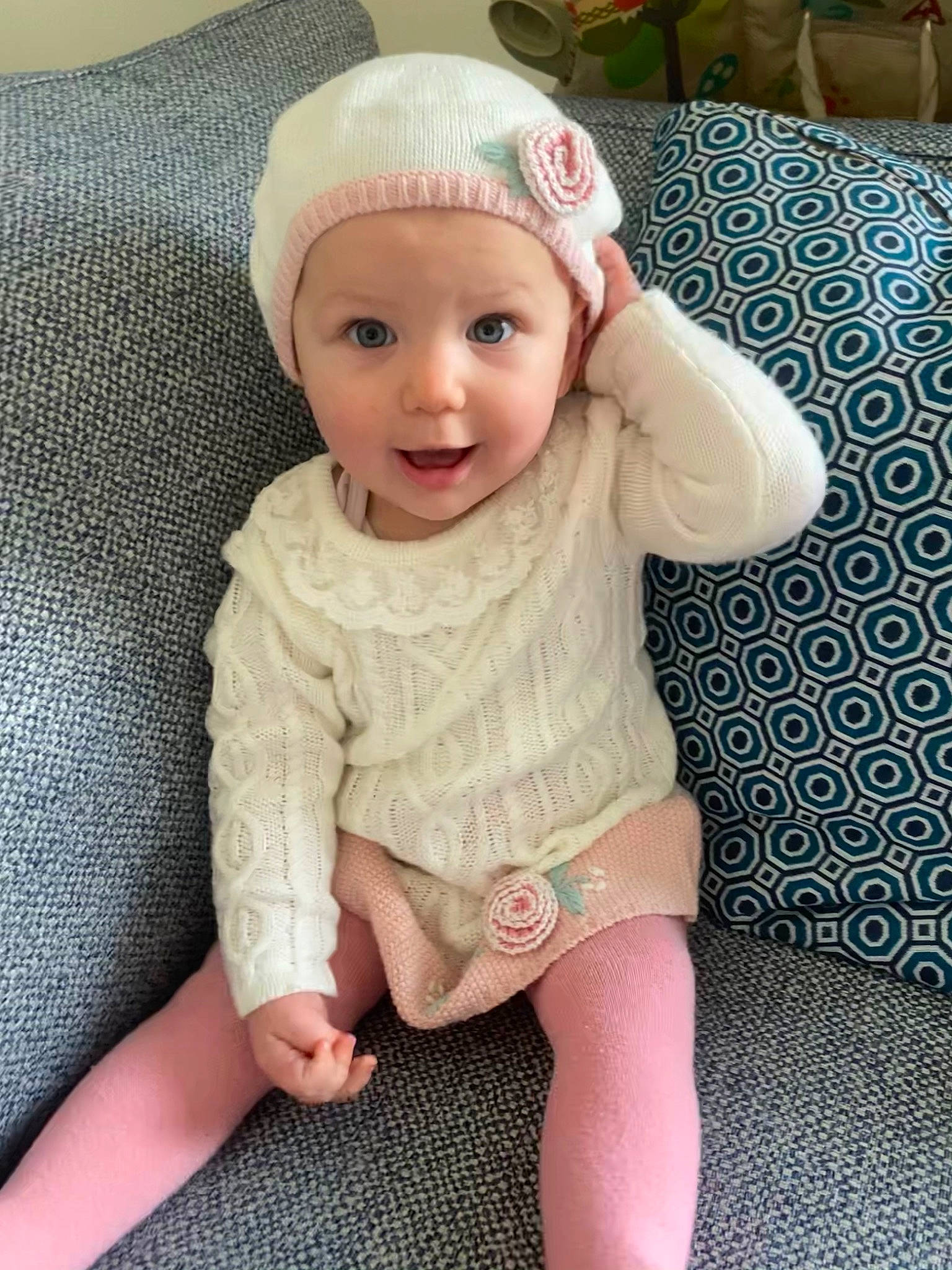 Mya-leigh joined the competition — help win amazing prizes! baby, baby_toddler_clothing, beanie, bonnet, costume_accessory, couch, eye, headband, headwear, home_accessories, linens, person, pillow, slipcover, sock, throw_pillow, toddler