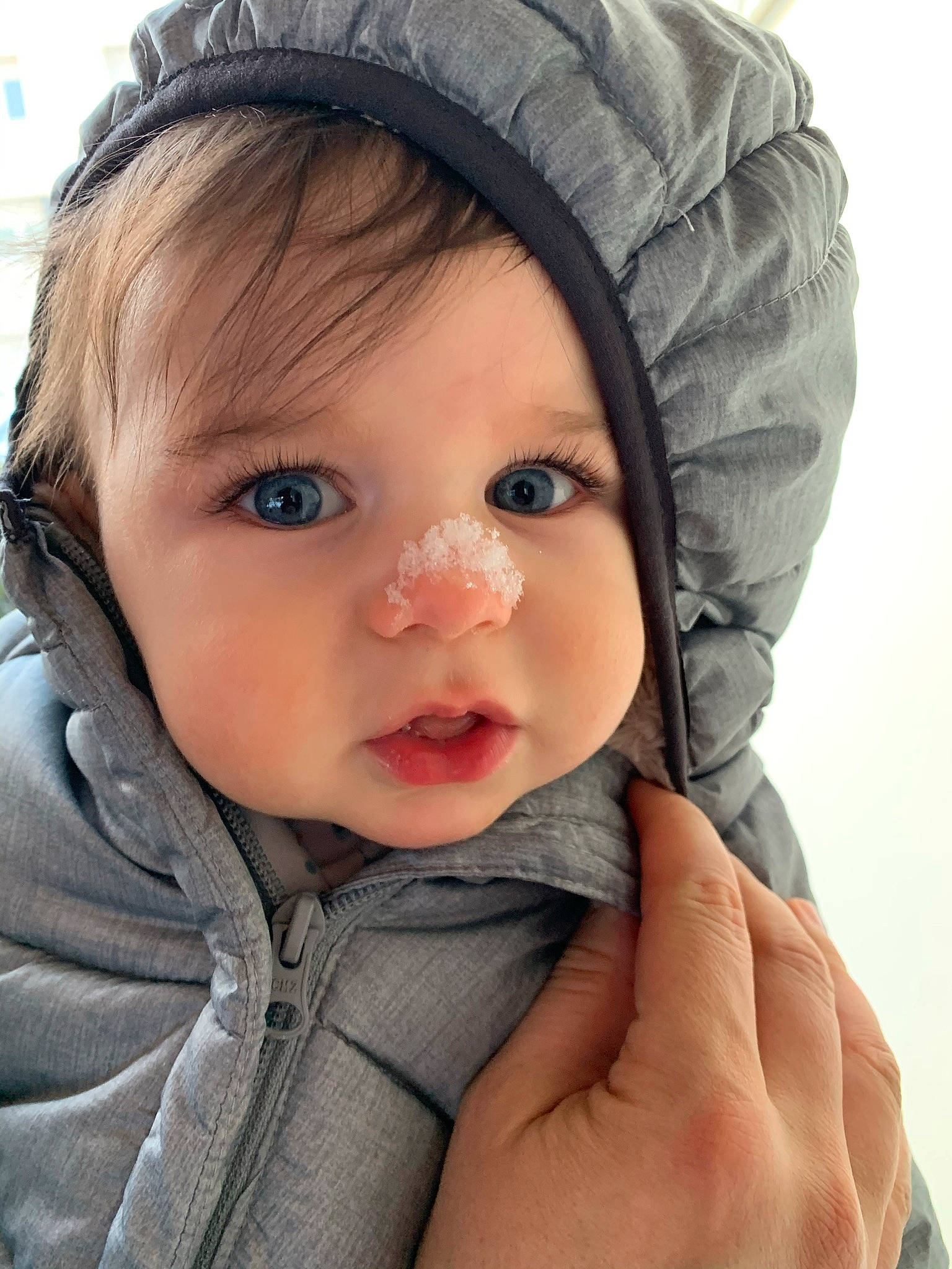 Andreas a rejoint le concours — aidez-le/la à gagner de superbes lots ! baby, baby_toddler_clothing, cap, cheek, chin, ear, eyebrow, eyelash, facial_expression, finger, gesture, hand, headgear, iris, lip, nose, outerwear, person, skin, sleeve
