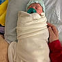 newborn, baby, blanket, pacifier, hat, sleeping, hand, red_sleeve, soft, cozy, wrapped, indoor, bed, pillow, cute, child, infant, person, rest, calm