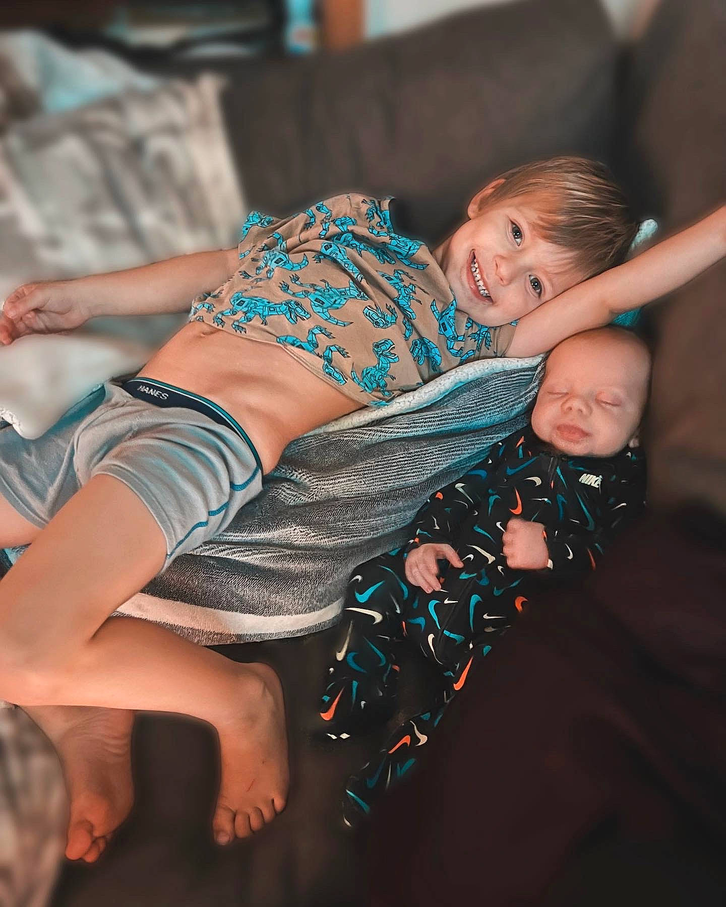 Ezra joined the competition — help win amazing prizes! abdomen, comfort, couch, elbow, flash_photography, foot, fun, happy, human_body, human_leg, joint, joy, knee, leg, leisure, muscle, person, shorts, sitting, smile