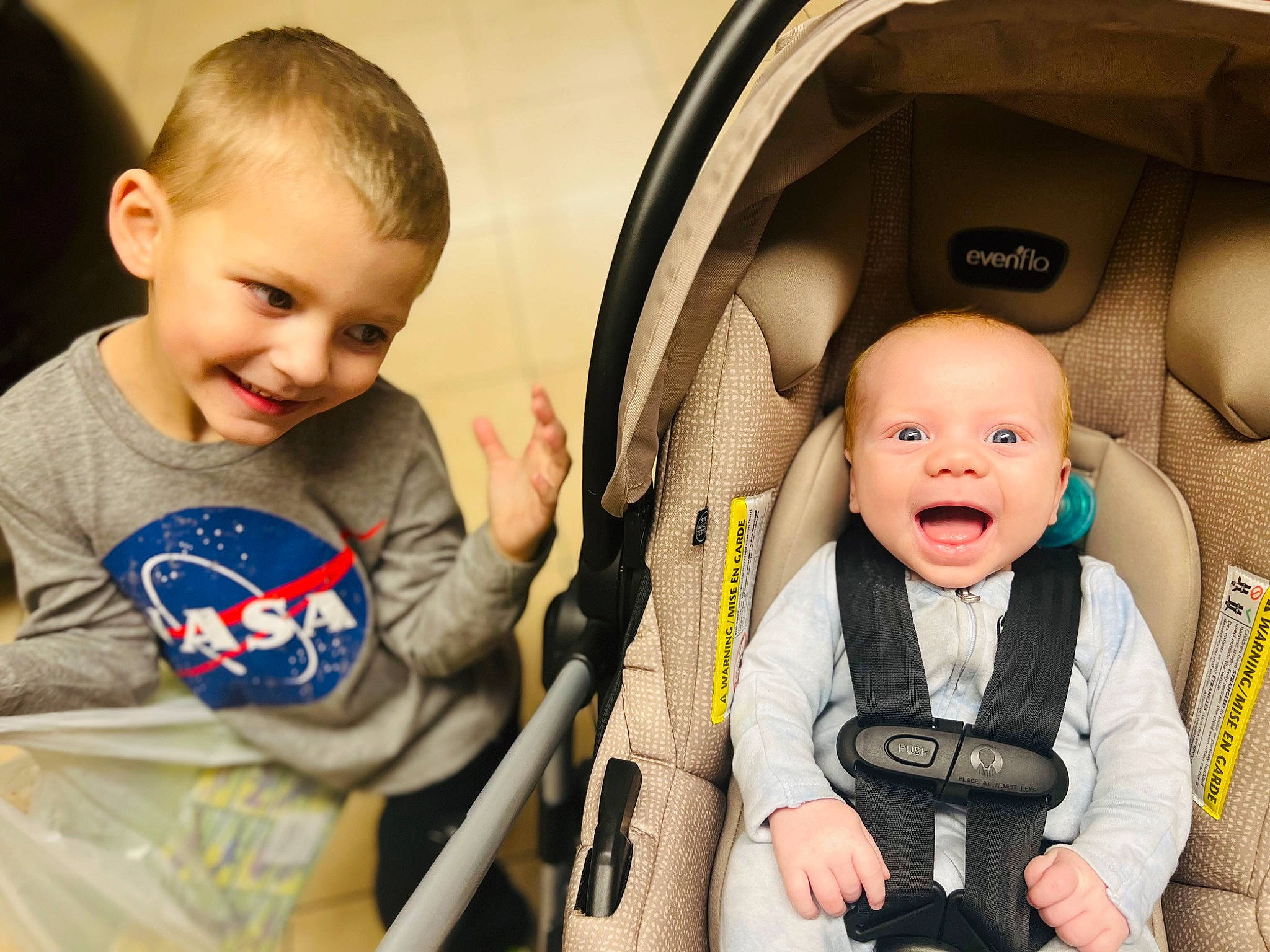 Ezra joined the competition — help win amazing prizes! auto_part, baby, baby_carriage, baby_products, baby_toddler_clothing, beauty, car_seat, cheek, child, comfort, fun, happy, head, joy, person, photograph, product, seat_belt, skin, smile