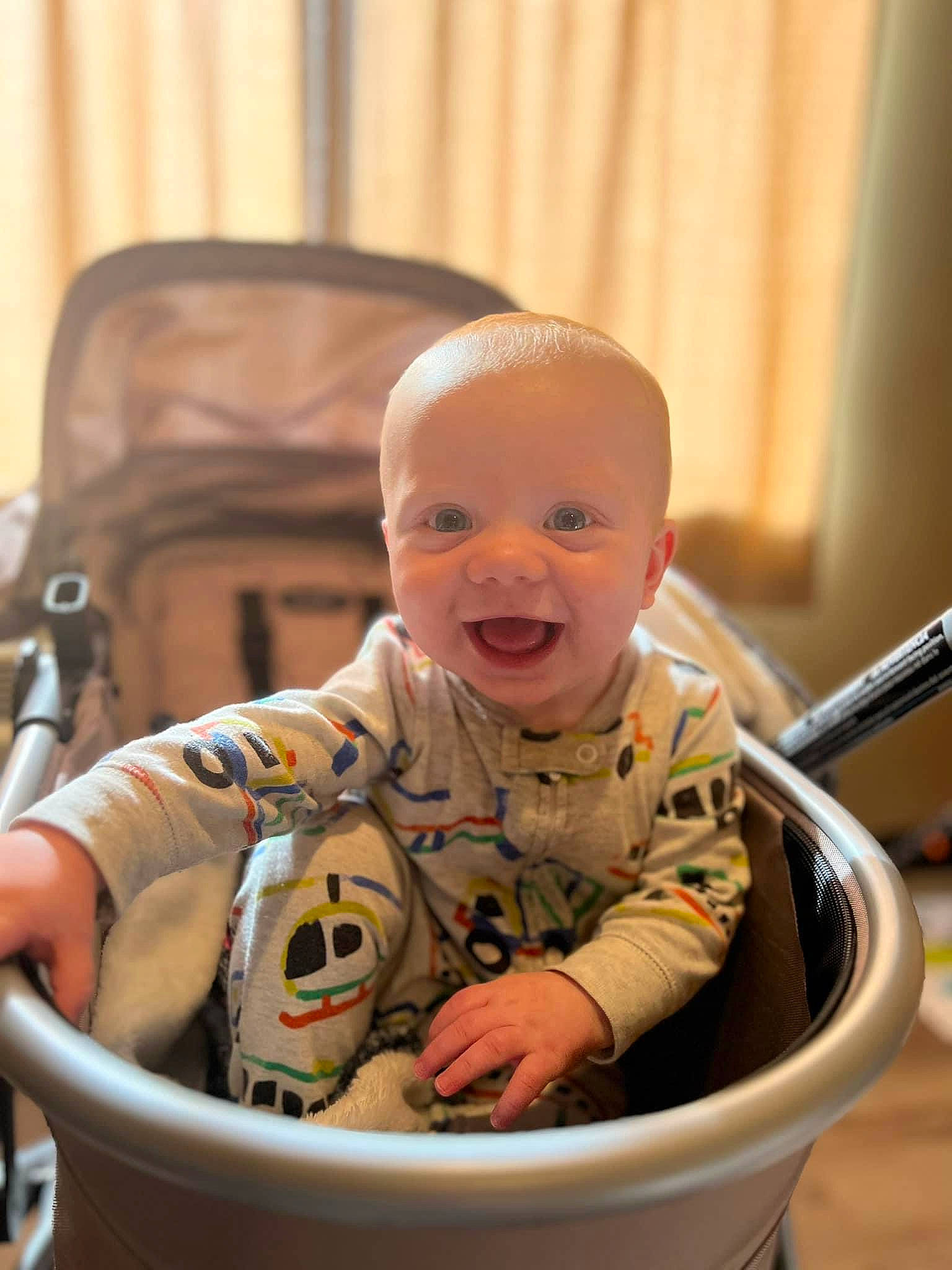 Oliver joined the competition — help win amazing prizes! baby, baby_laughing, baby_products, baby_safety, baby_toddler_clothing, baby_toys, bib, chair, cheek, child, comfort, eye, fun, happy, laugh, person, product, room, sitting, smile