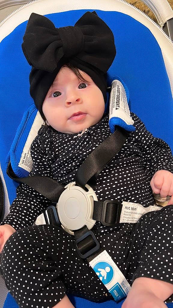 Giselle joined the competition — help win amazing prizes! baby, baby_carriage, baby_products, baby_safety, baby_toddler_clothing, blue, cap, child, comfort, electric_blue, fashion_accessory, fun, hat, headwear, pattern, person, photograph, sitting, sleeve, snapshot