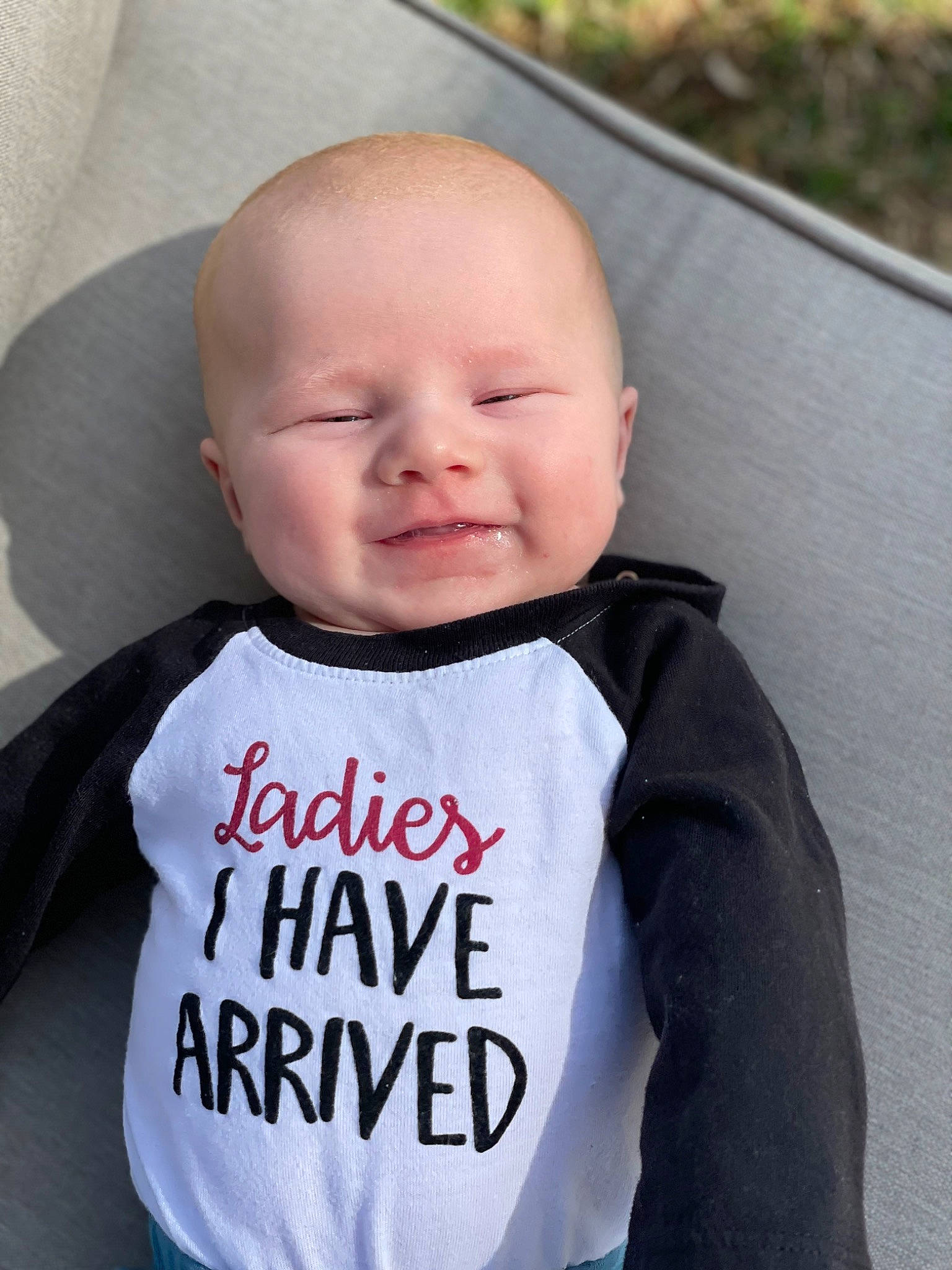 Carter joined the competition — help win amazing prizes! baby, baby_products, baby_toddler_clothing, cheek, child, electric_blue, eye, face, facial_expression, hairstyle, happy, head, long_sleeved_t_shirt, person, plant, product, skin, sleeve, smile, t_shirt