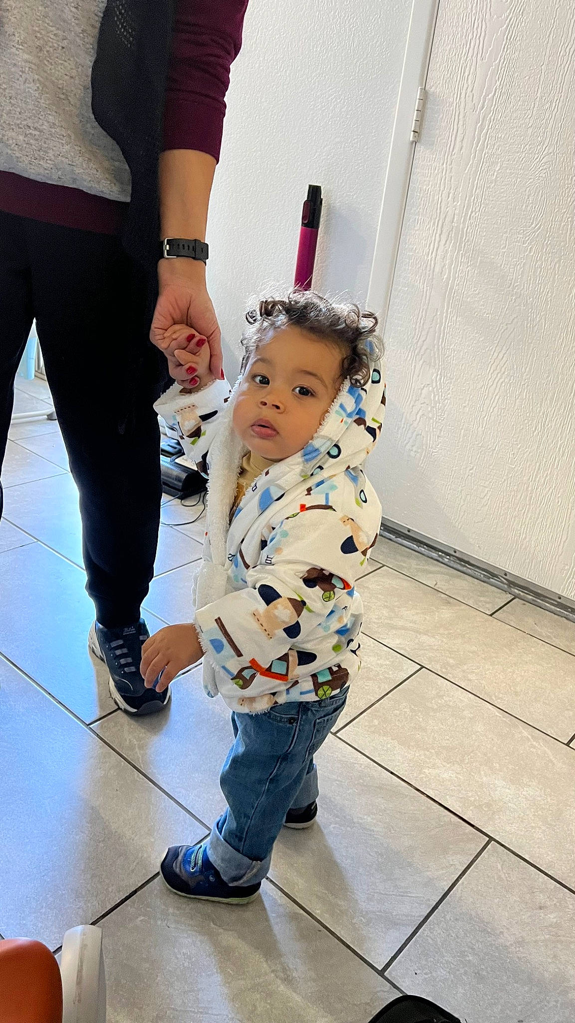 Kaiden joined the competition — help win amazing prizes! bag, boot, child, denim, fashion_design, flooring, footwear, fun, gesture, happy, human_leg, jeans, joint, outerwear, person, sandal, shoe, sleeve, sneakers, toddler
