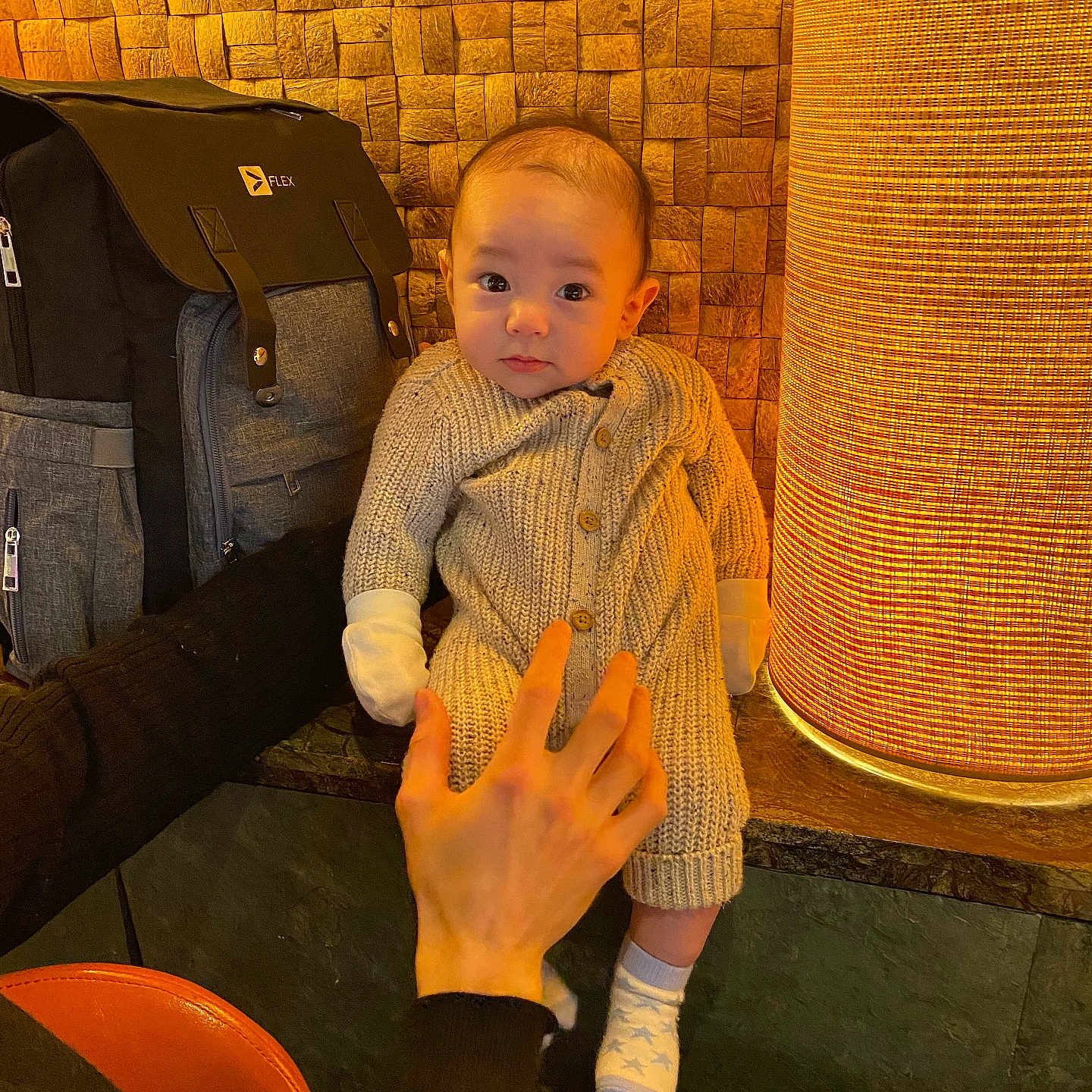 Jaidan Gabriel is registered to the contest to win money with this photo: baby, bodypart, chair, clothing, couch, face, finger, furniture, hand, head, hosiery, jeans, knitwear, pants, person, photography, portrait, sitting, sock, sweater