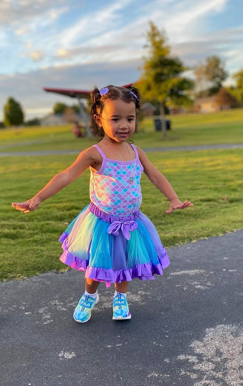 Kailani joined the competition — help win amazing prizes! asphalt, baby_toddler_clothing, child, cloud, dress, electric_blue, footwear, fun, grass, grassland, happy, leisure, person, pink, plant, purple, recreation, road, sky, toddler