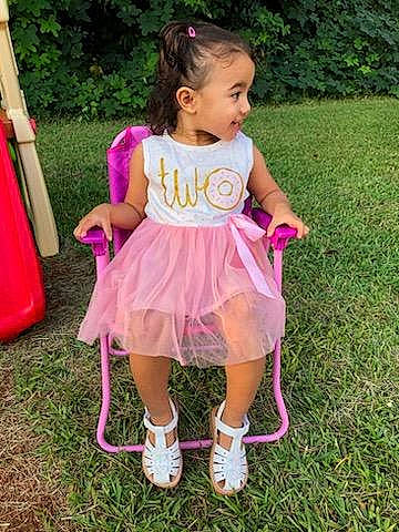 Kailani joined the competition — help win amazing prizes! baby_products, baby_toddler_clothing, child, chute, day_dress, fun, grass, happy, magenta, pattern, people_in_nature, person, pink, plant, play, purple, recreation, sandal, summer, toddler