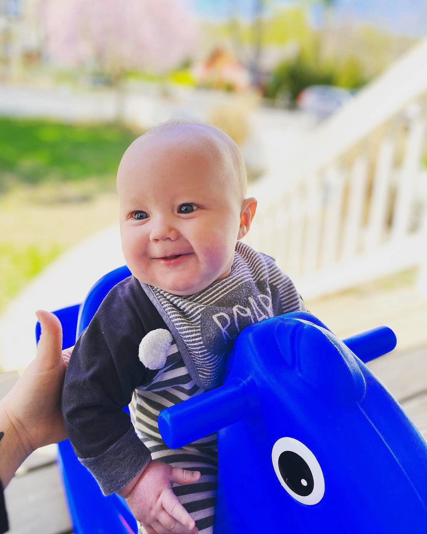 Wyatt is registered to the contest to win money with this photo: azure, baby, baby_toddler_clothing, blue, child, electric_blue, facial_expression, fun, grass, happy, human_settlement, joy, leisure, person, play, public_space, recreation, smile, t_shirt, toddler
