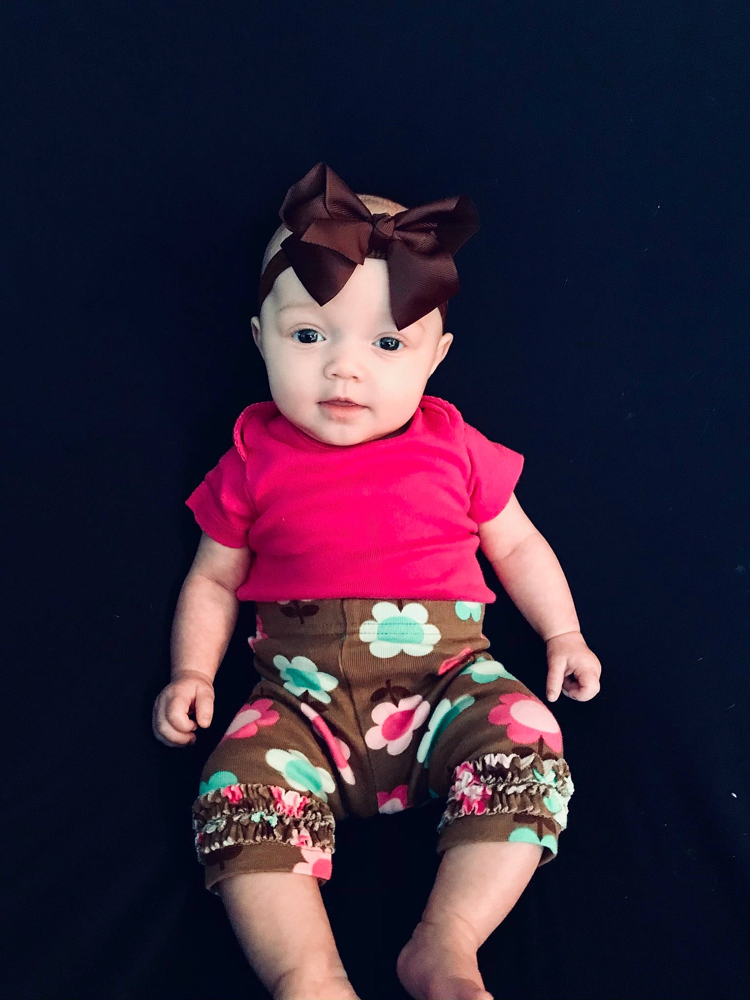 Carmen joined the competition — help win amazing prizes! baby, black_hair, cheek, child, ear, eye, hand, head, lip, pattern, person, photo_shoot, photography, pink, sitting, skin, sleeve, space, toddler