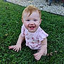 baby, child, grass, outdoor, smiling, pink_clothing, crawling, happy, blue_eyes, red_hair, nature, greenery, summer, toddler, cute, infant, playful, sunlight, ground, garden