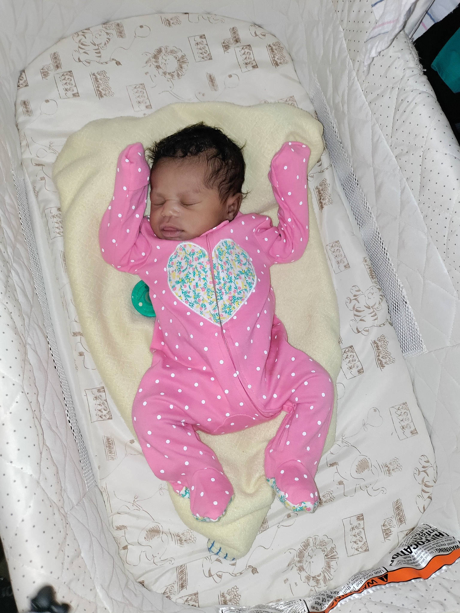 Tory is registered to the contest to win money with this photo: baby, baby_products, baby_safety, baby_sleeping, baby_toddler_clothing, bedding, cheek, child, comfort, design, infant_bed, linens, magenta, pattern, person, pink, product, room, sleeve, textile