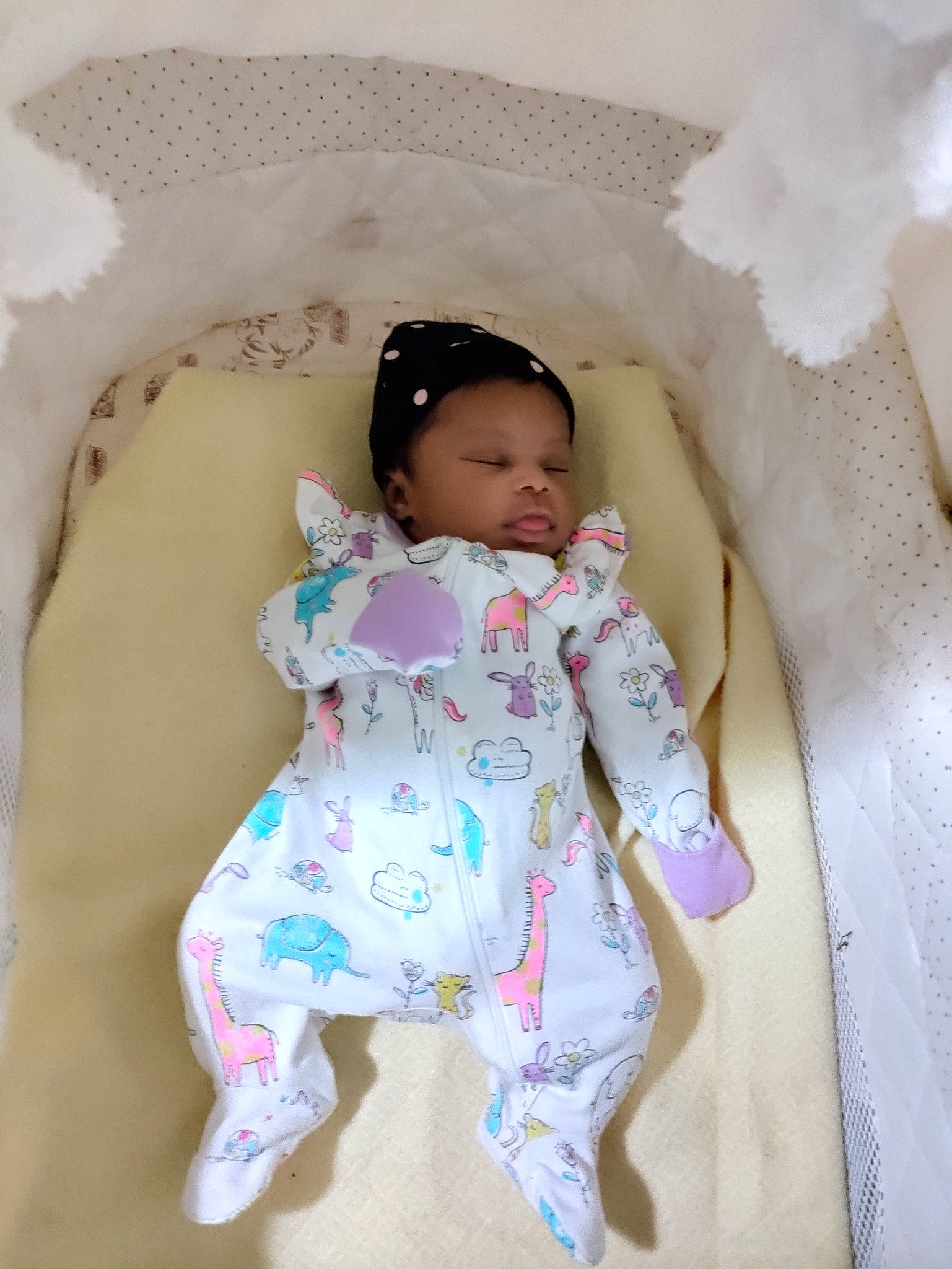 Tory is registered to the contest to win money with this photo: baby, baby_products, baby_safety, baby_toddler_clothing, cheek, comfort, eye, face, fashion_design, happy, head, linens, magenta, pattern, person, pink, room, sitting, sleeve, t_shirt