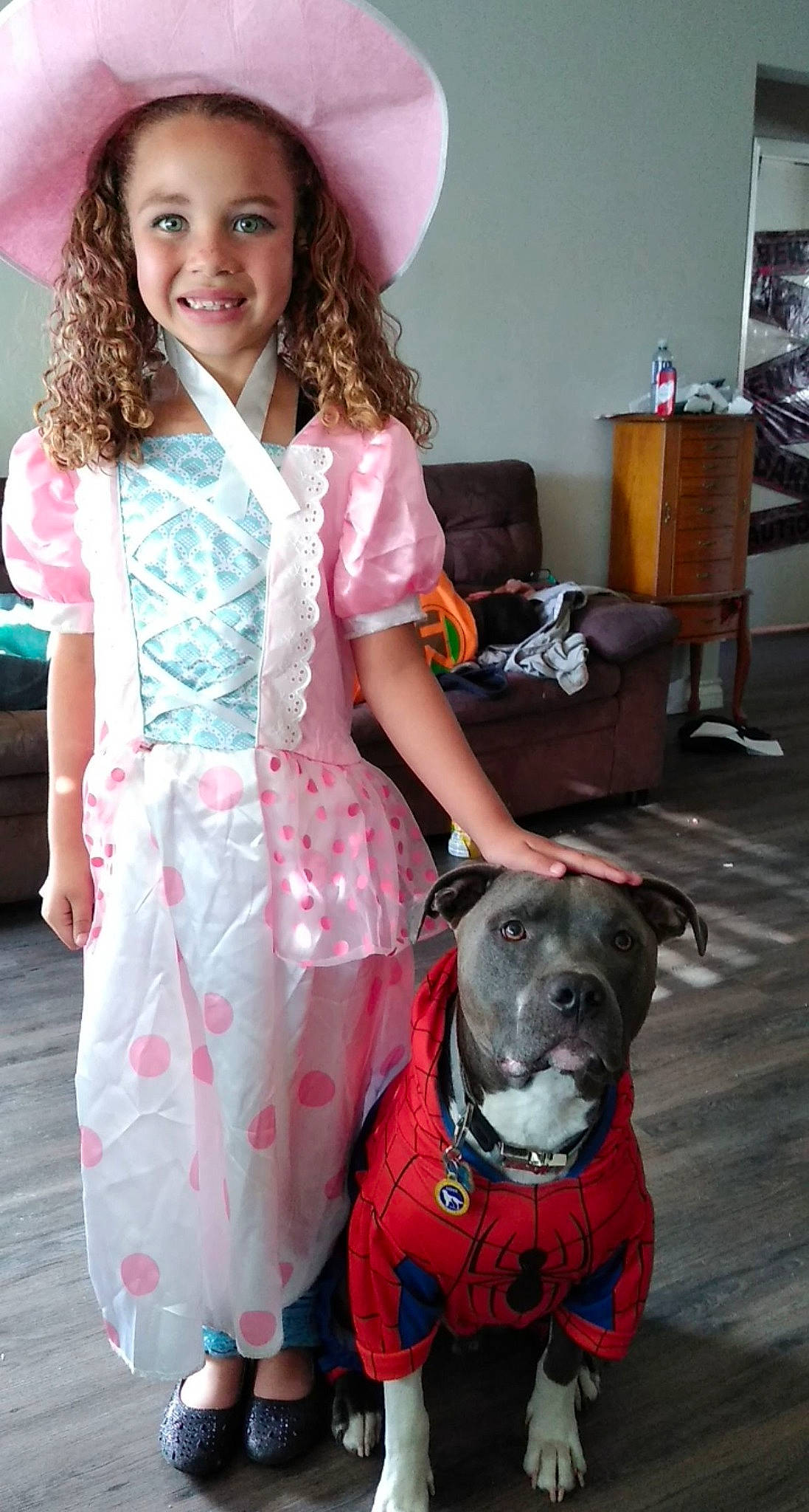 Aurora joined the competition — help win amazing prizes! american_pit_bull_terrier, american_staffordshire_terrier, canidae, carnivore, child, companion_dog, costume, dog, dog_breed, fawn, joy, non_sporting_group, person, pink, pit_bull, sporting_group, staffordshire_bull_terrier